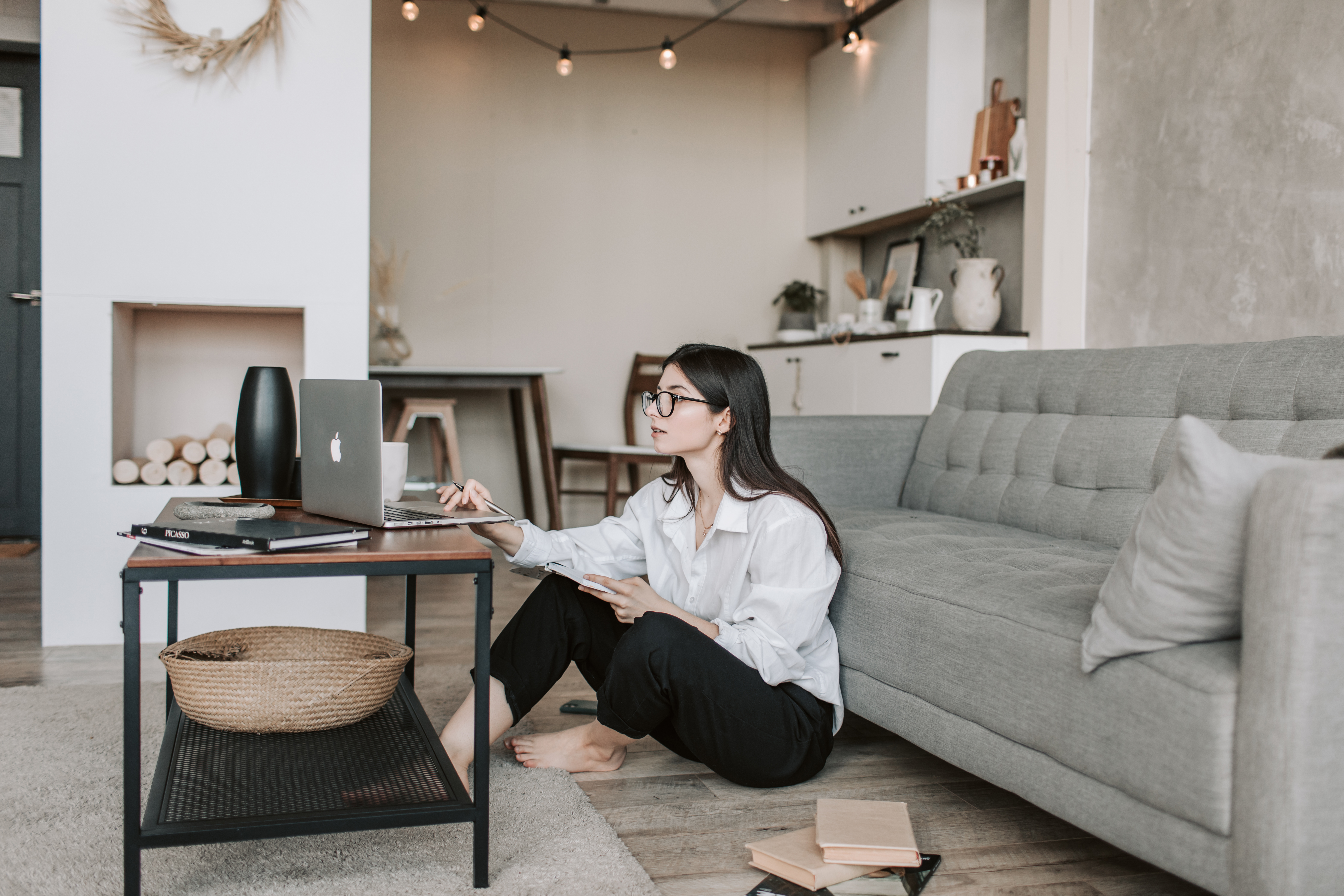 Canva – Woman Sitting On The Floor While Using Her Laptop (1)